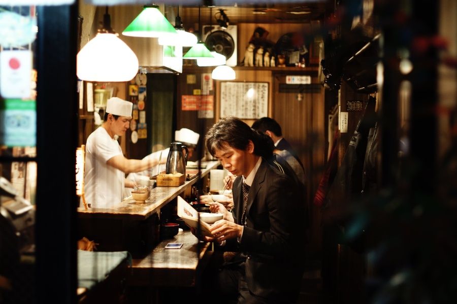 People eating in a restaurant in Japan