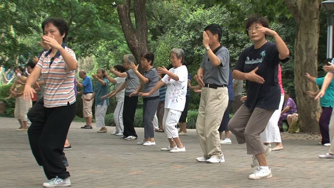 Doing tai-chi is what to do in Shibuya Japan