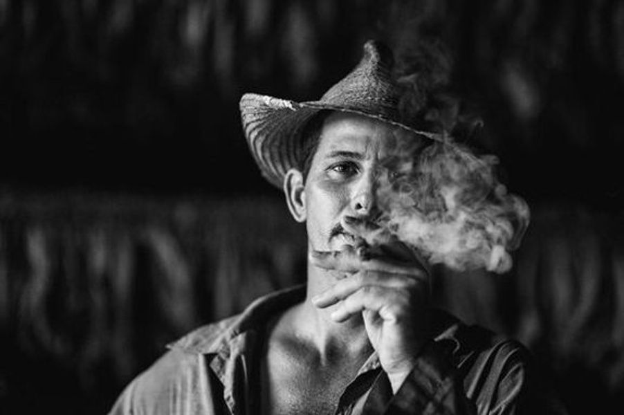 man smoking Cuba black and white 