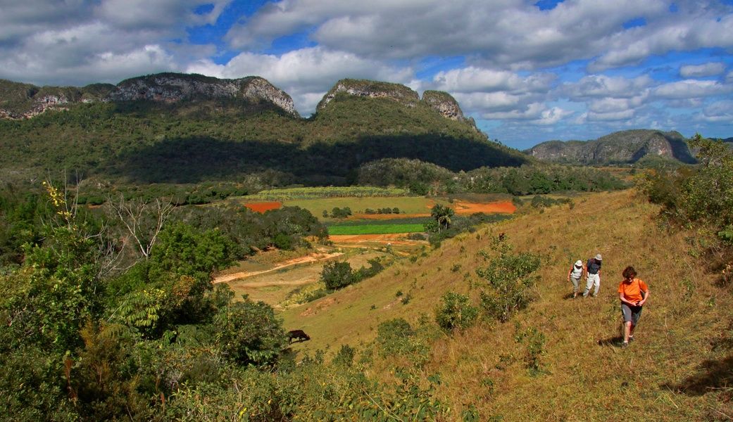 Clouds and grass-covered mountains in Vinales Cuba's 7 Wonders