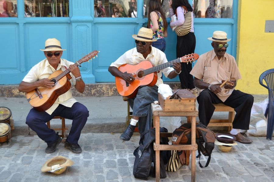 men playing guitar local guide things to do in Havana Cuba