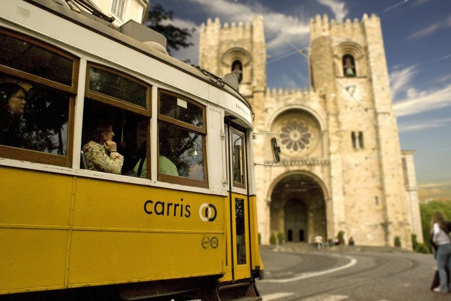 Taking a ride on Lisbon's yellow tram is a great thing to do in Portugal
