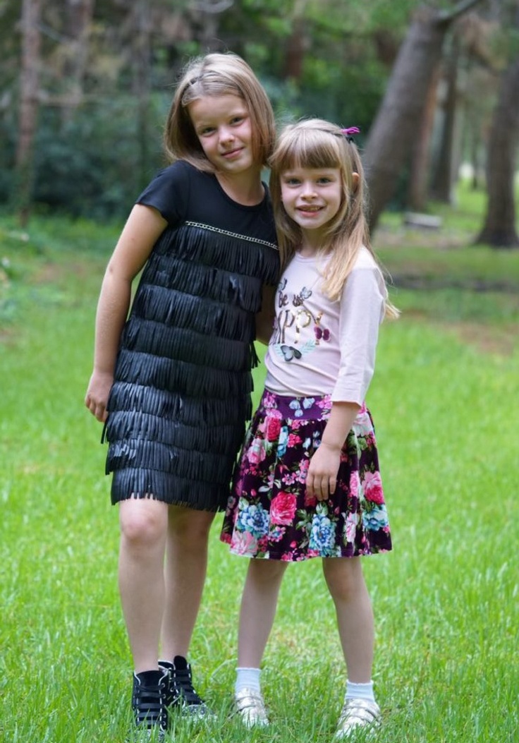 Two girls in kidpik outfits