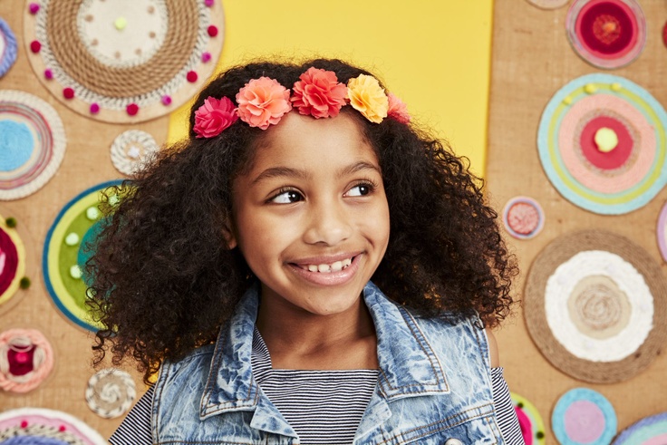 Closeup of girl smiling in summer clothes