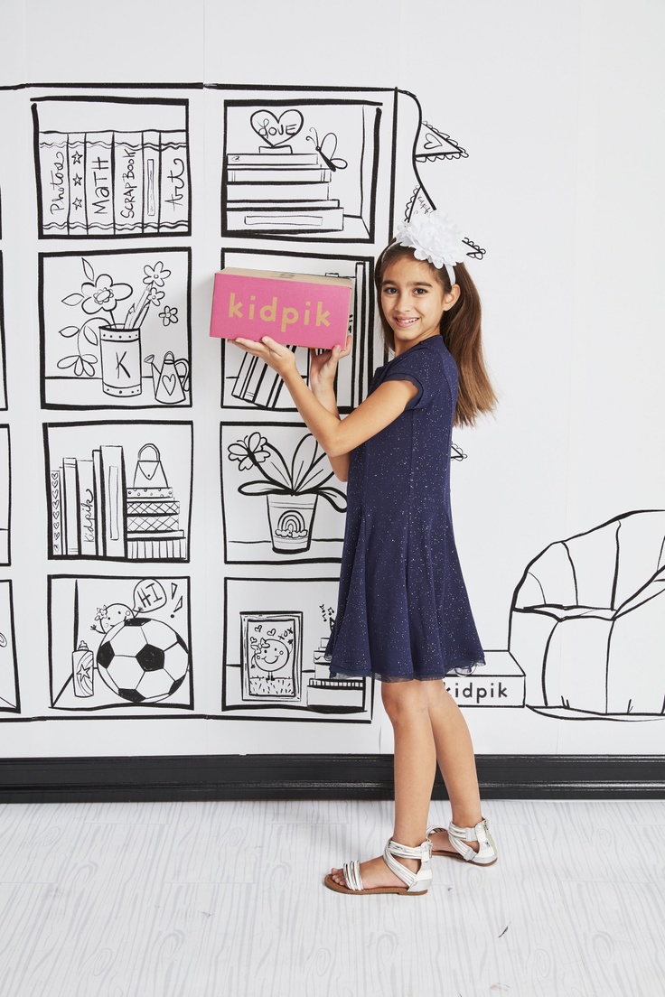 girl with kidpik subscription box