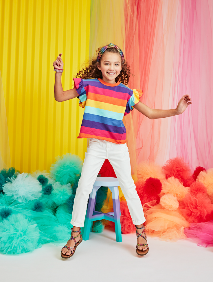 kid in colorful clothes