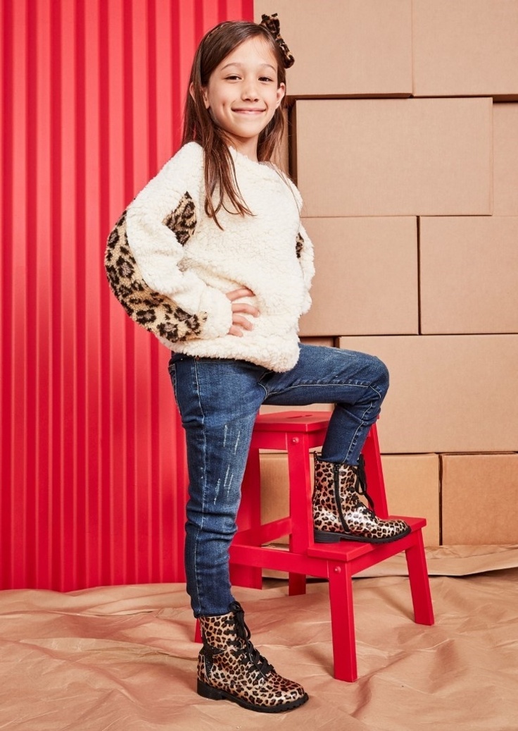 Girl with animal print boots