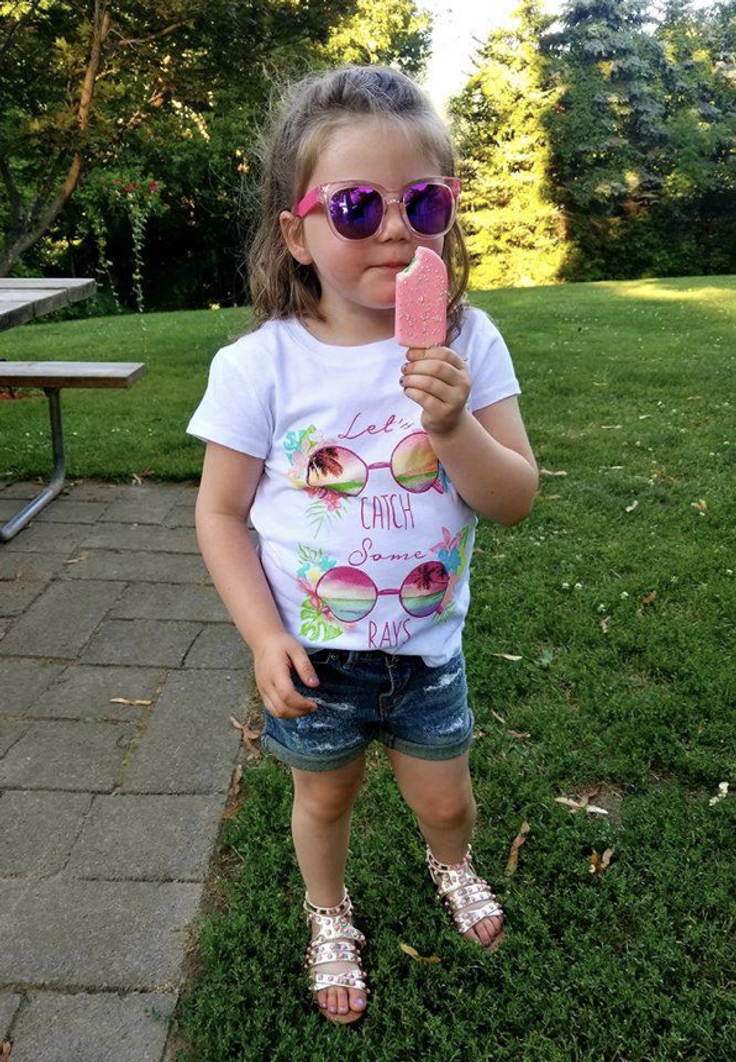 girl eating ice pop