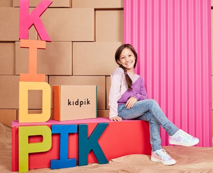 Girl with kidpik clothing box