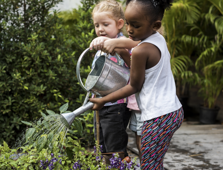 2 girls gardening