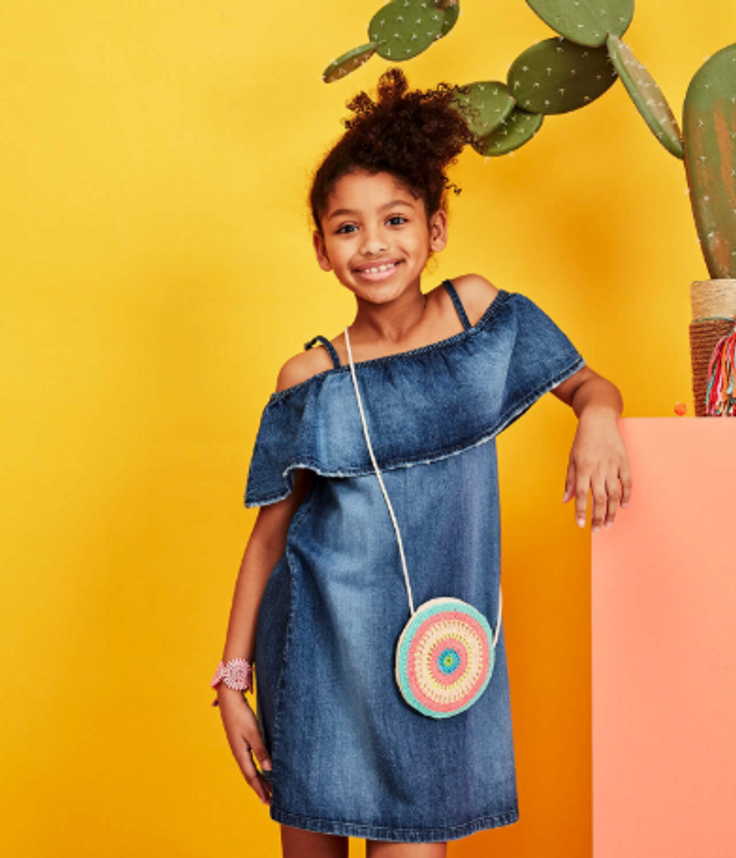 Girl wearing denim summer dress