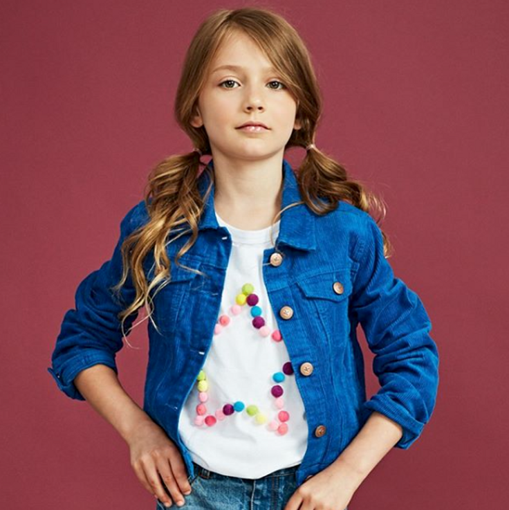 Girl in kidpik clothing outfit