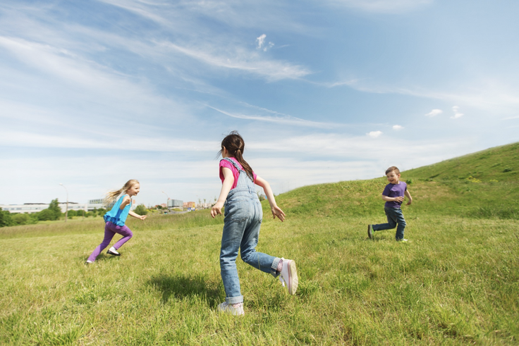 Kids playing in a field