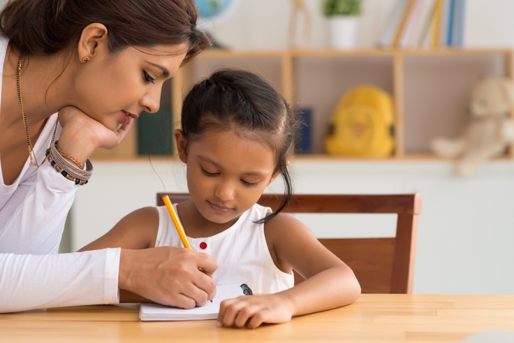 Girl and mom drawing