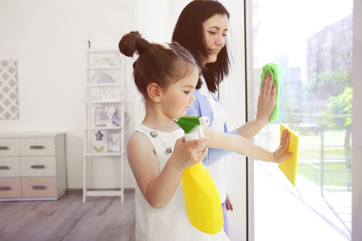 family cleaning windows