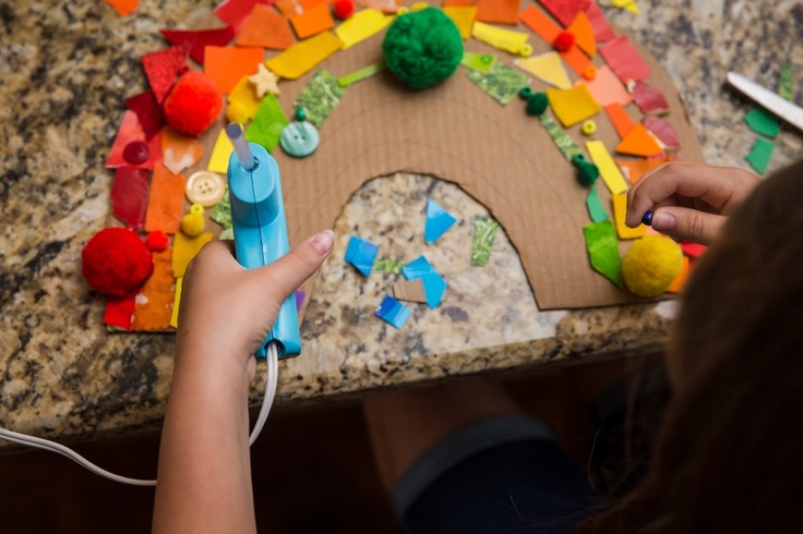 Girl making craft rainbow