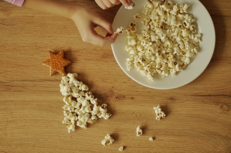 A picture containing food, table, indoor, person