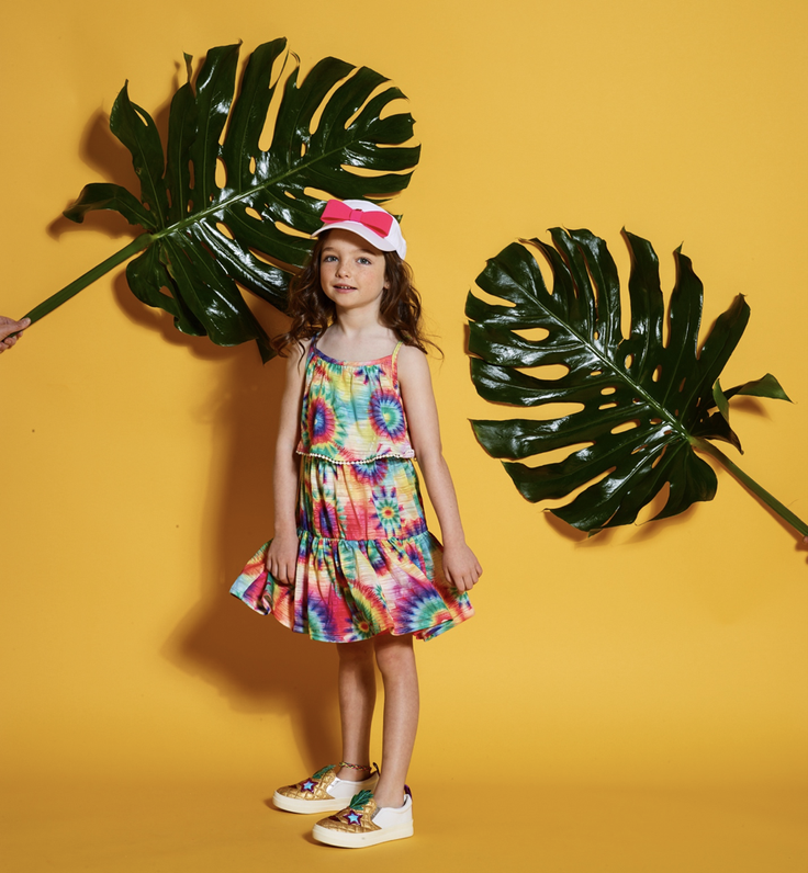 girl wearing a tie-dye dress 