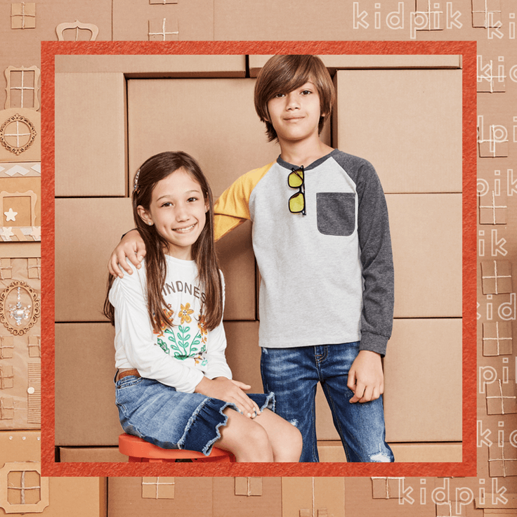 Boy and girl wearing subscription outfits