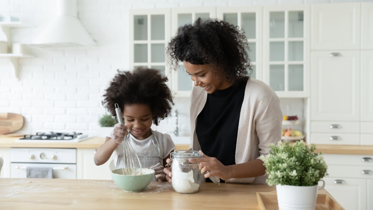 Girl and mom making icecream