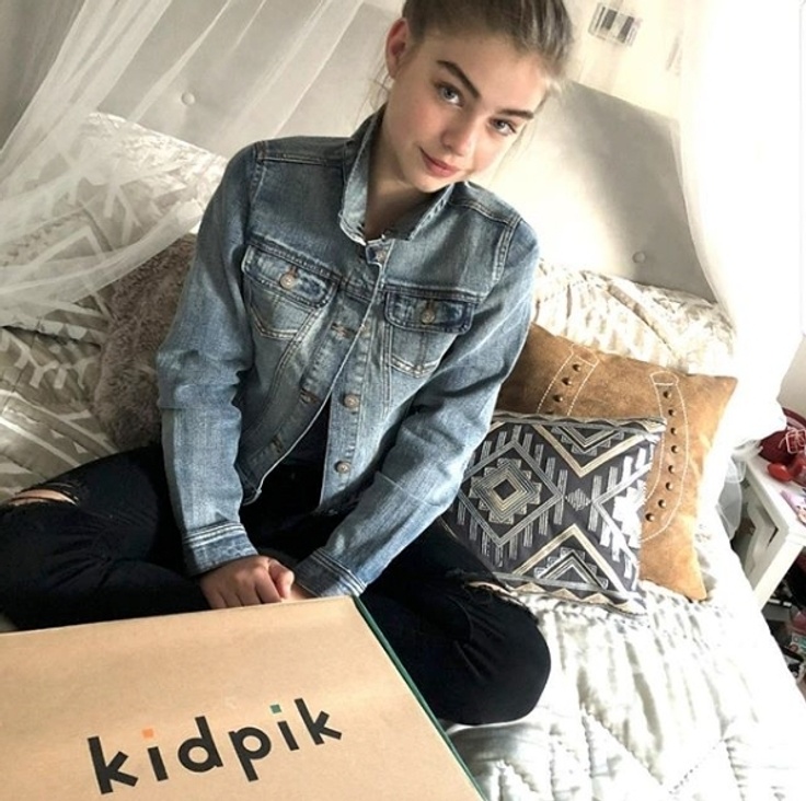 Girl with kidpik box